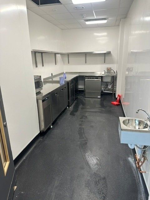 Completed back-of-house counter with undercounter dishwasher and hand wash sink at the Jubilee Sports Centre