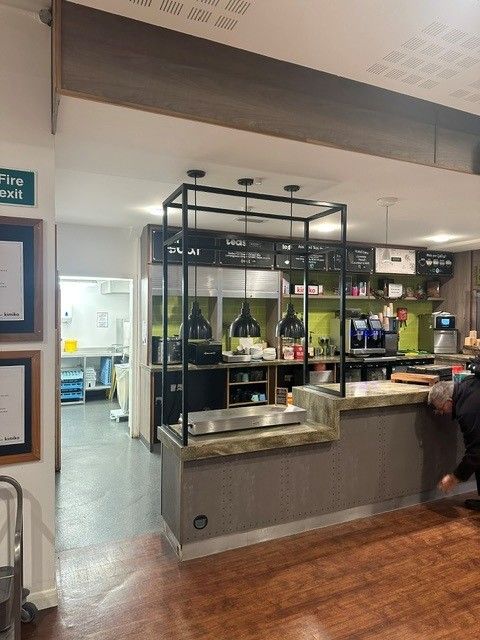 New lit display gantry over the student canteen counter at Winchester School of Art